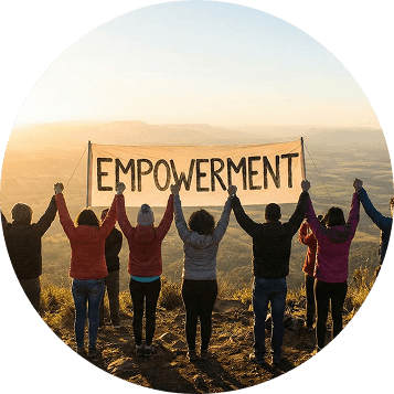 Group of people raising arms together